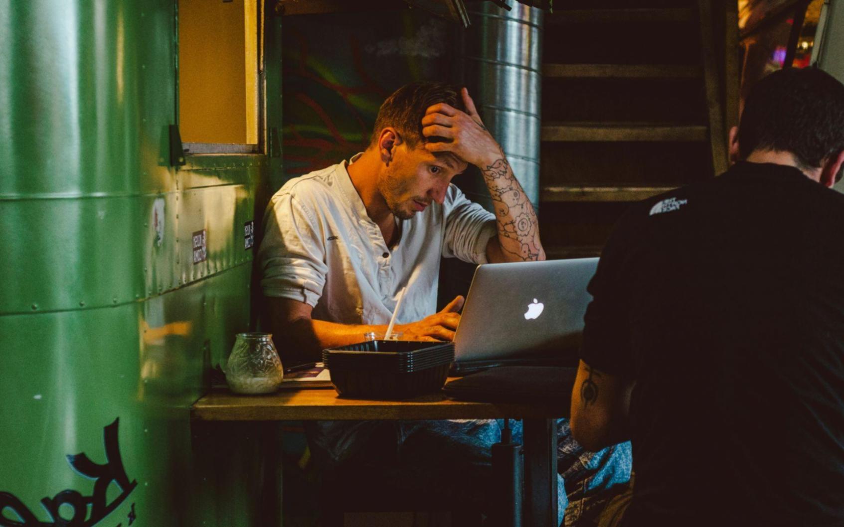Business professionals analyzing financial data and charts in a modern office environment